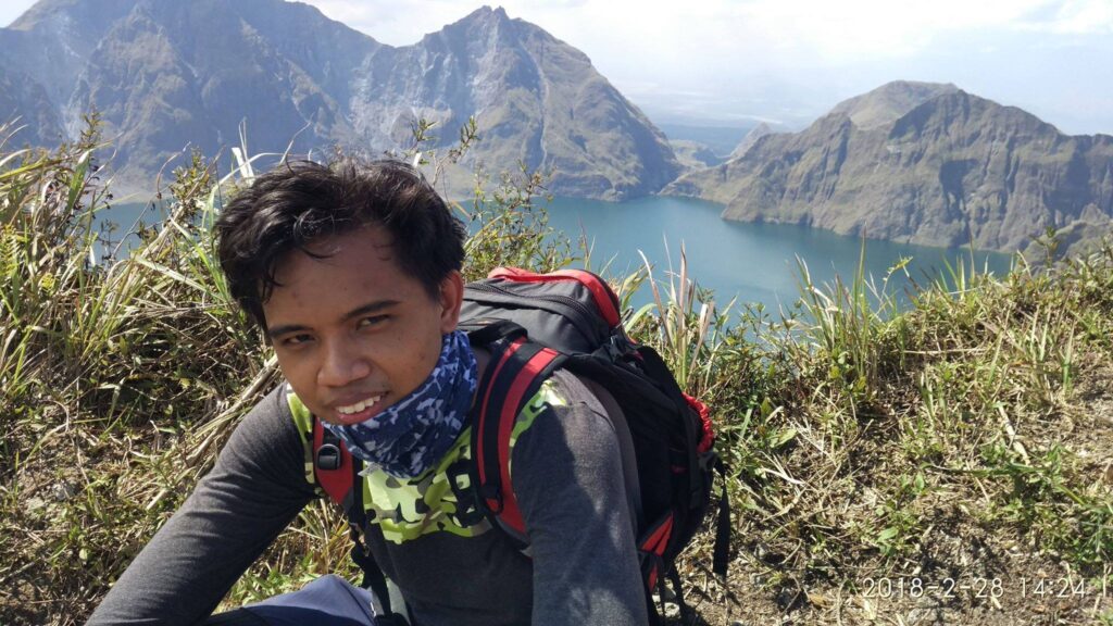 taking picture at the summit of Mt. Pinatubo
