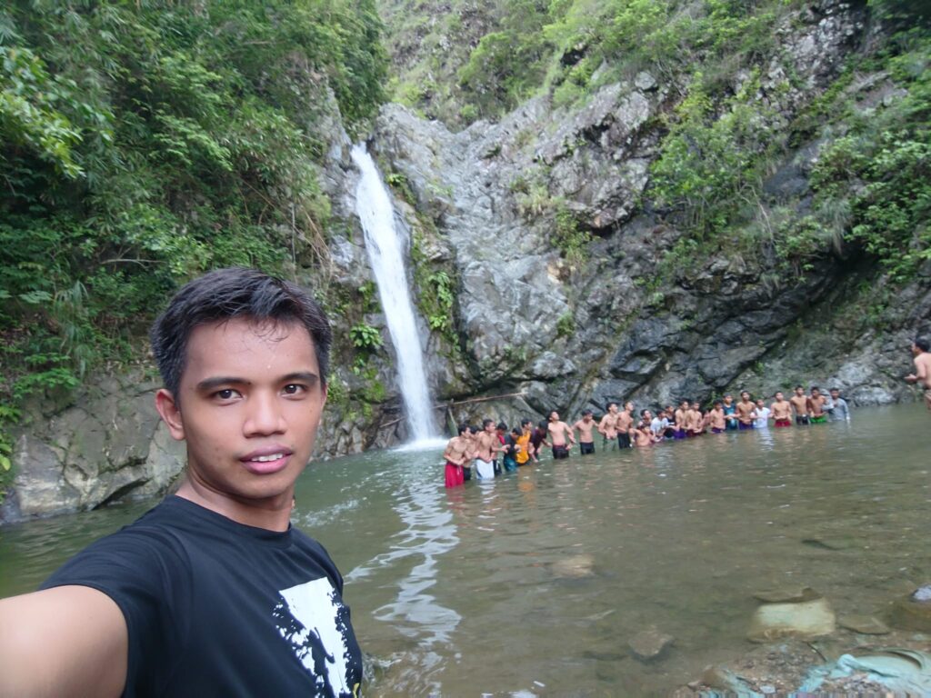 taking picture at Aloha Falls