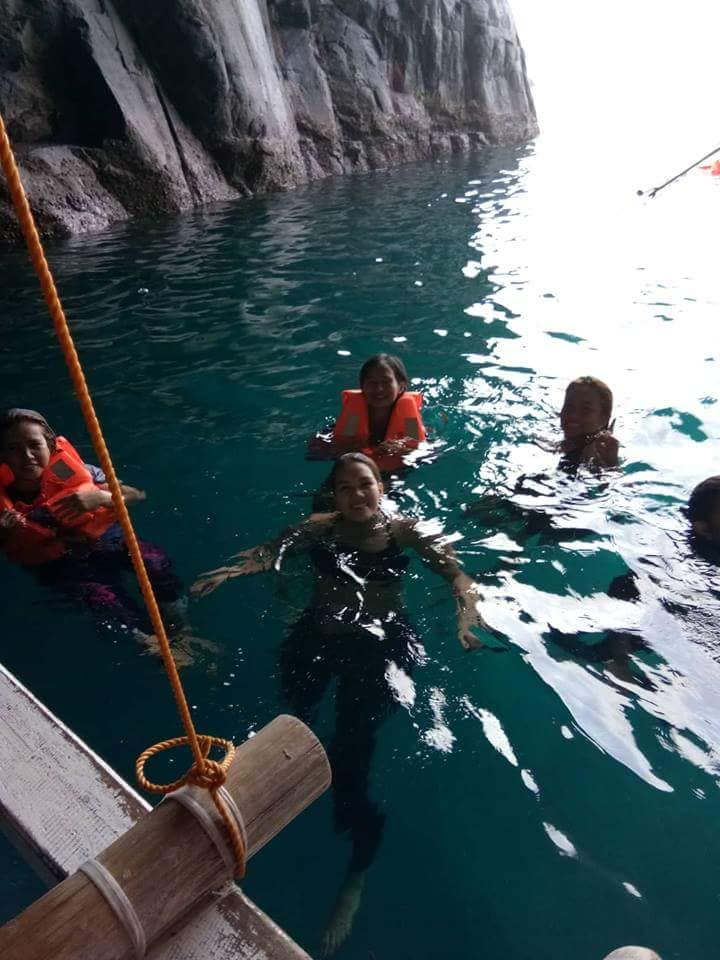 swimming at Lamao Caves