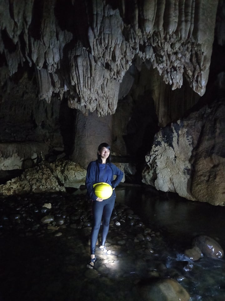picture taking at huge stalactite formation of Cavinti Cave