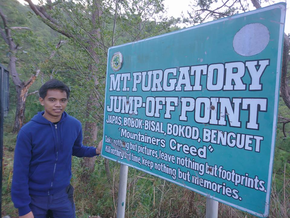 solo picture at Mt. Purgatory jump-off point marker