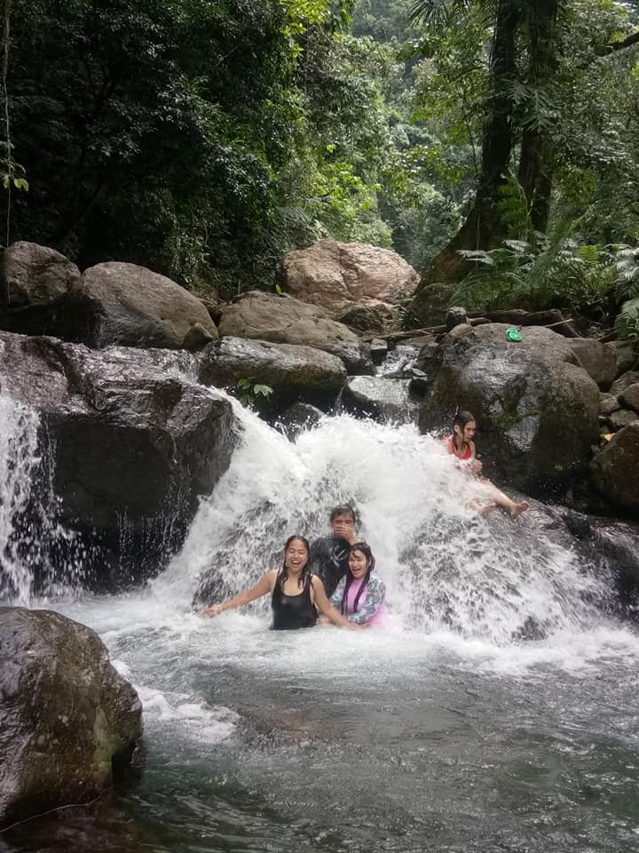 swimming at the mini waterfalls of Ditumabo
