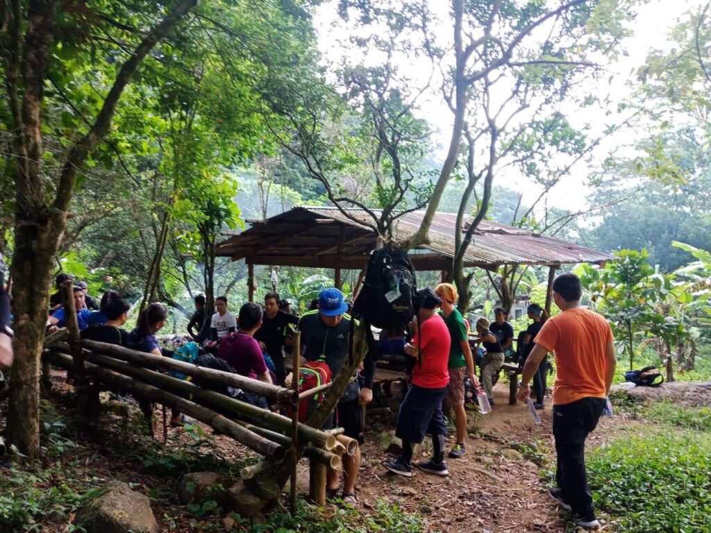 hikers resting in the nipa hut