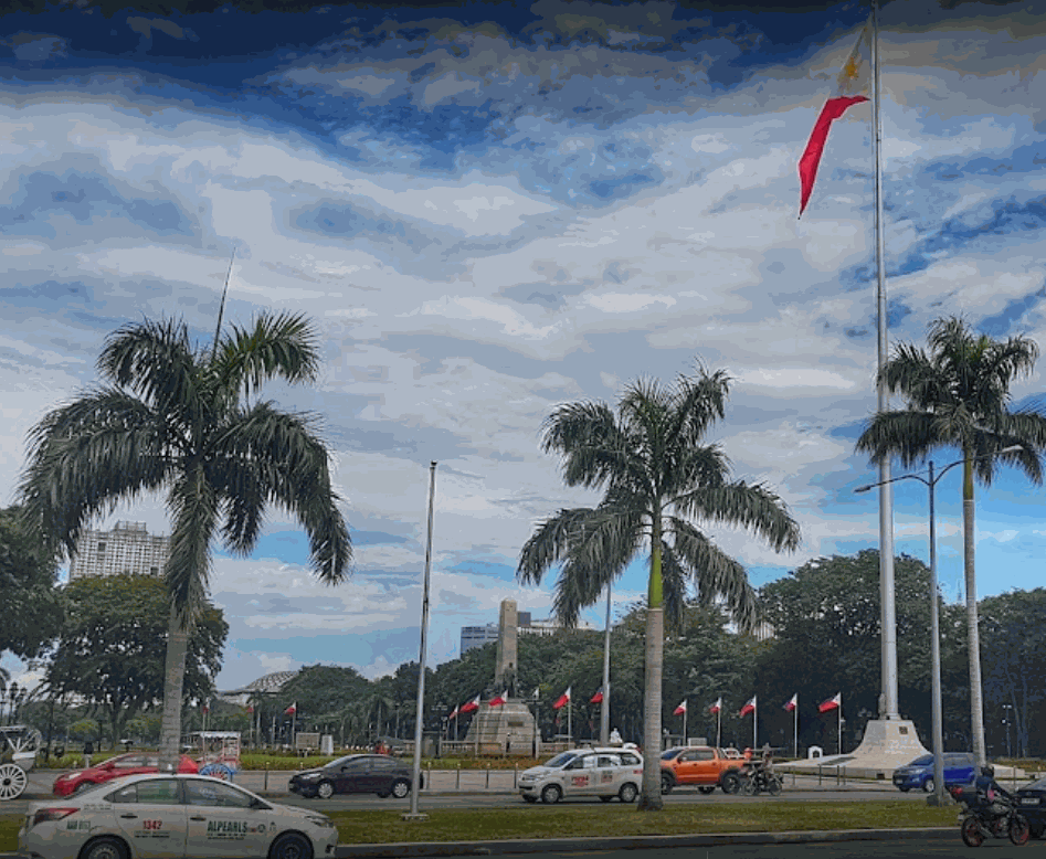 Independence Flagpole and the Rizal Monument