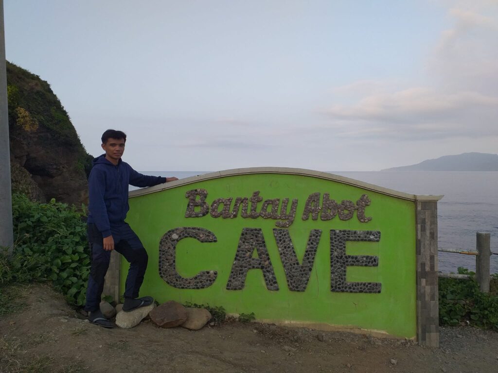 a solo picture with the Bantay Abot Cave signage