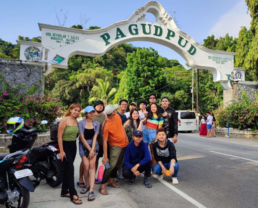 group picture at Pagudpud Welcome Arch