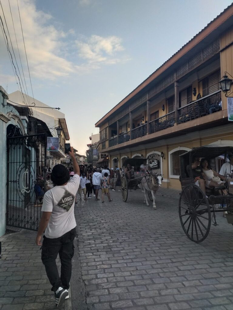 picture taking at the horse-drawn carriages